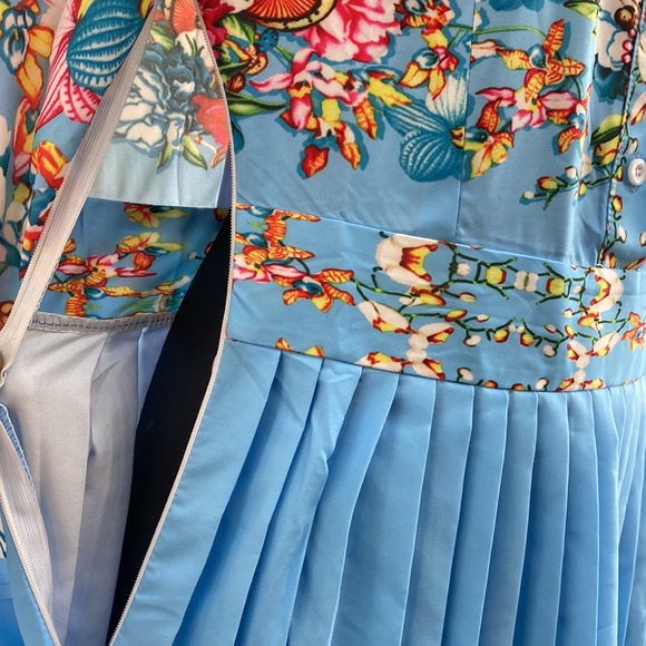 Blue floral dress with collar, button front , and invisible side zipper. - Picture 3 of 3